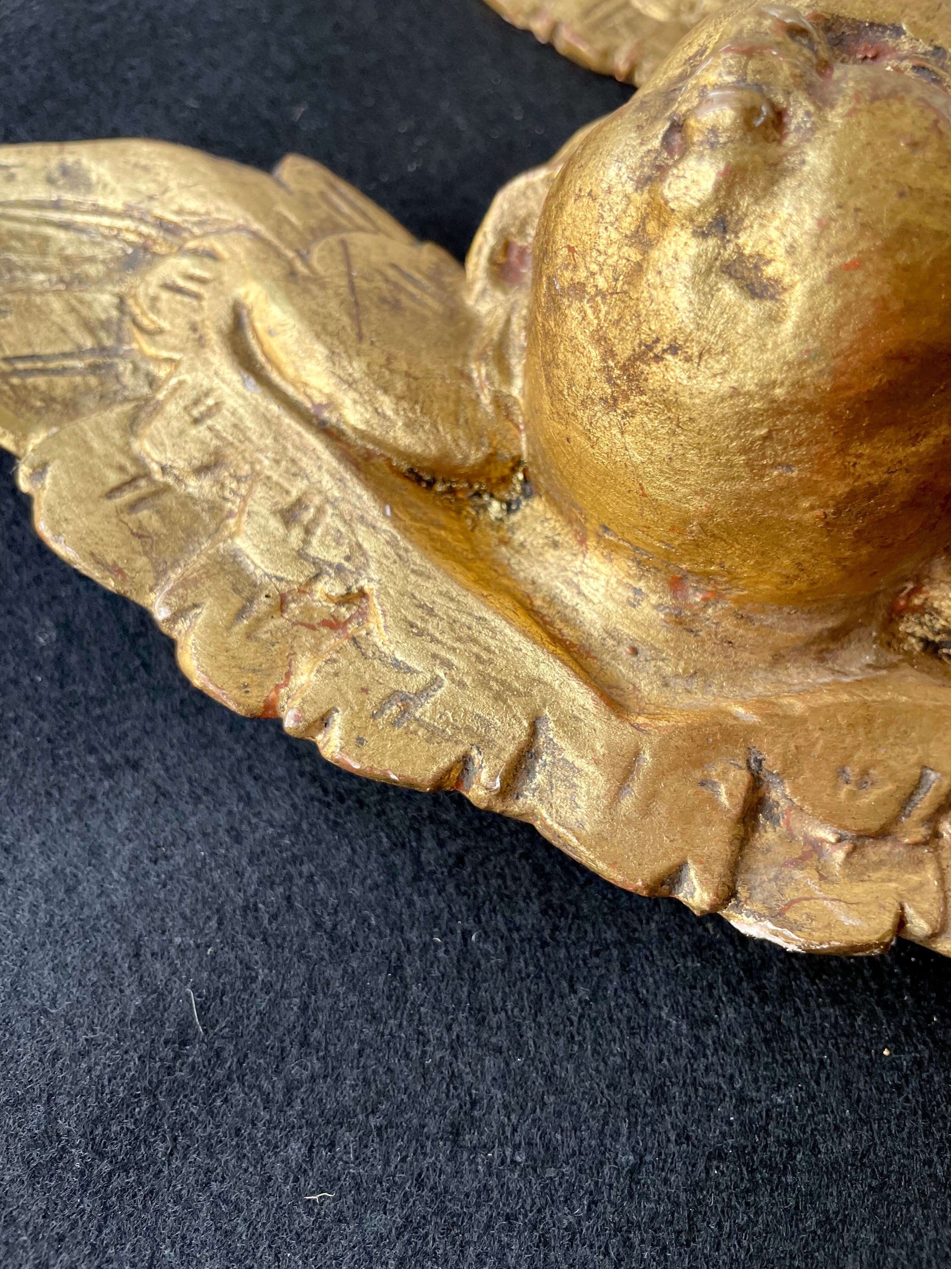 Pair of angels in gilded wood