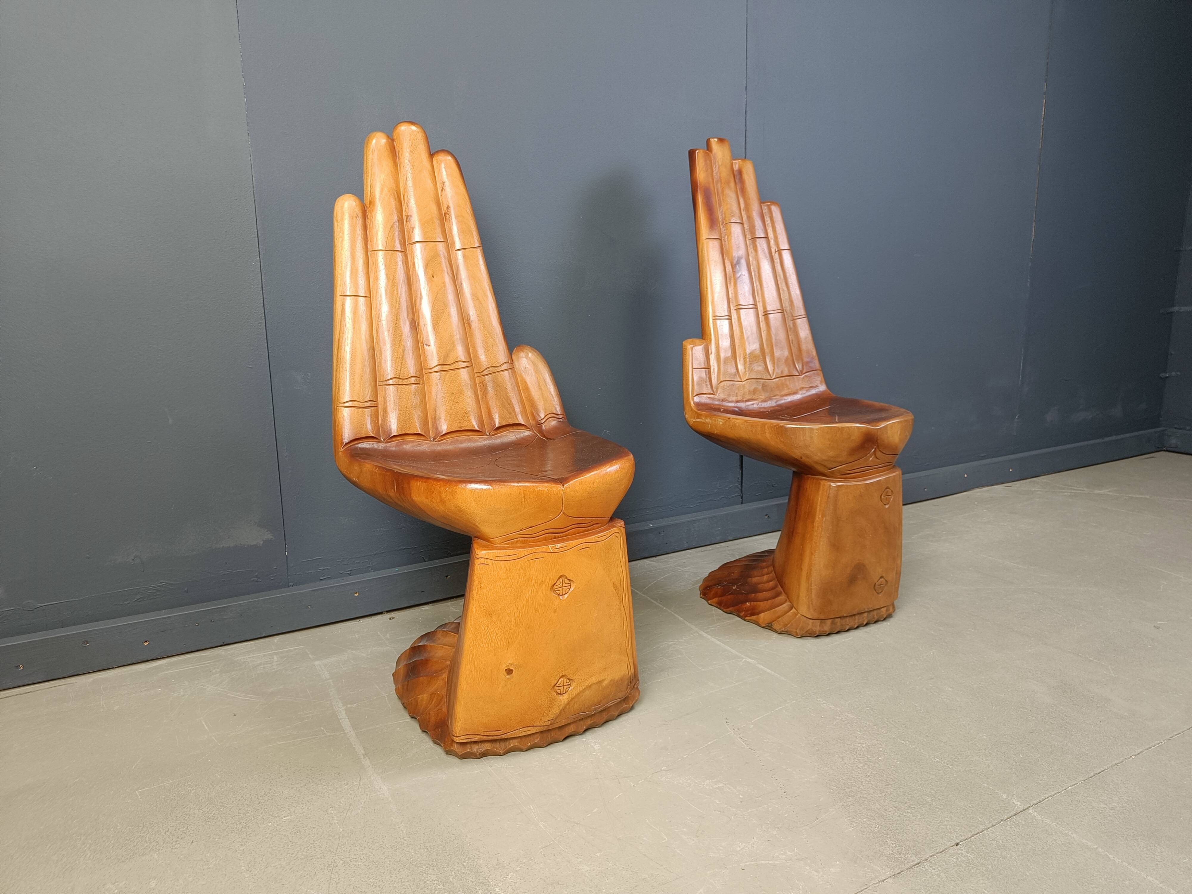 Pair of hand shaped teak chairs, 1970s