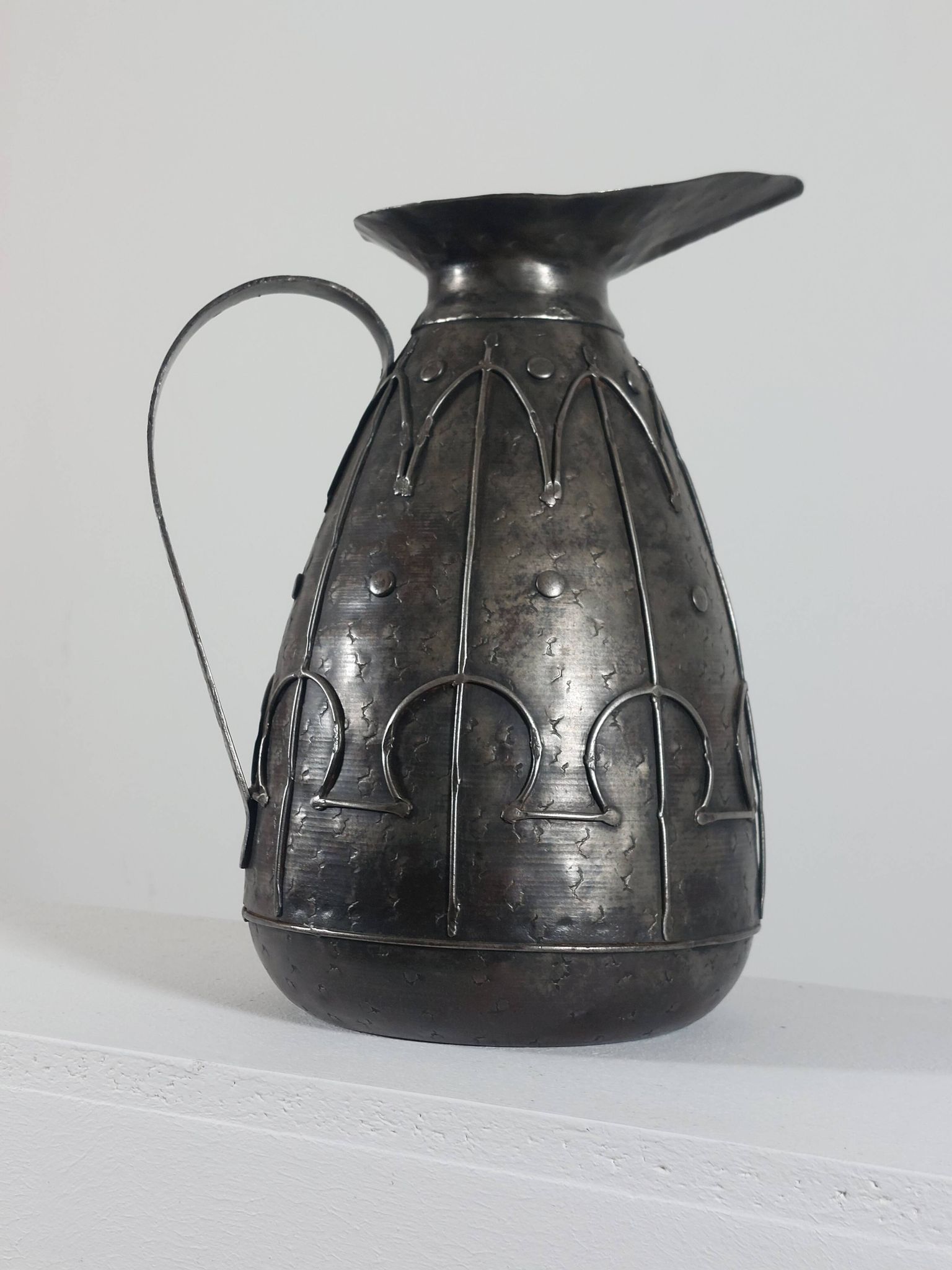 Rare hand-forged metal pitcher and craftsmanship from France.