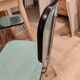 Pair of green Formica chairs with Eiffel legs