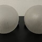 Pair of Inda metal and chiseled glass wall lights