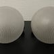 Pair of Inda metal and chiseled glass wall lights