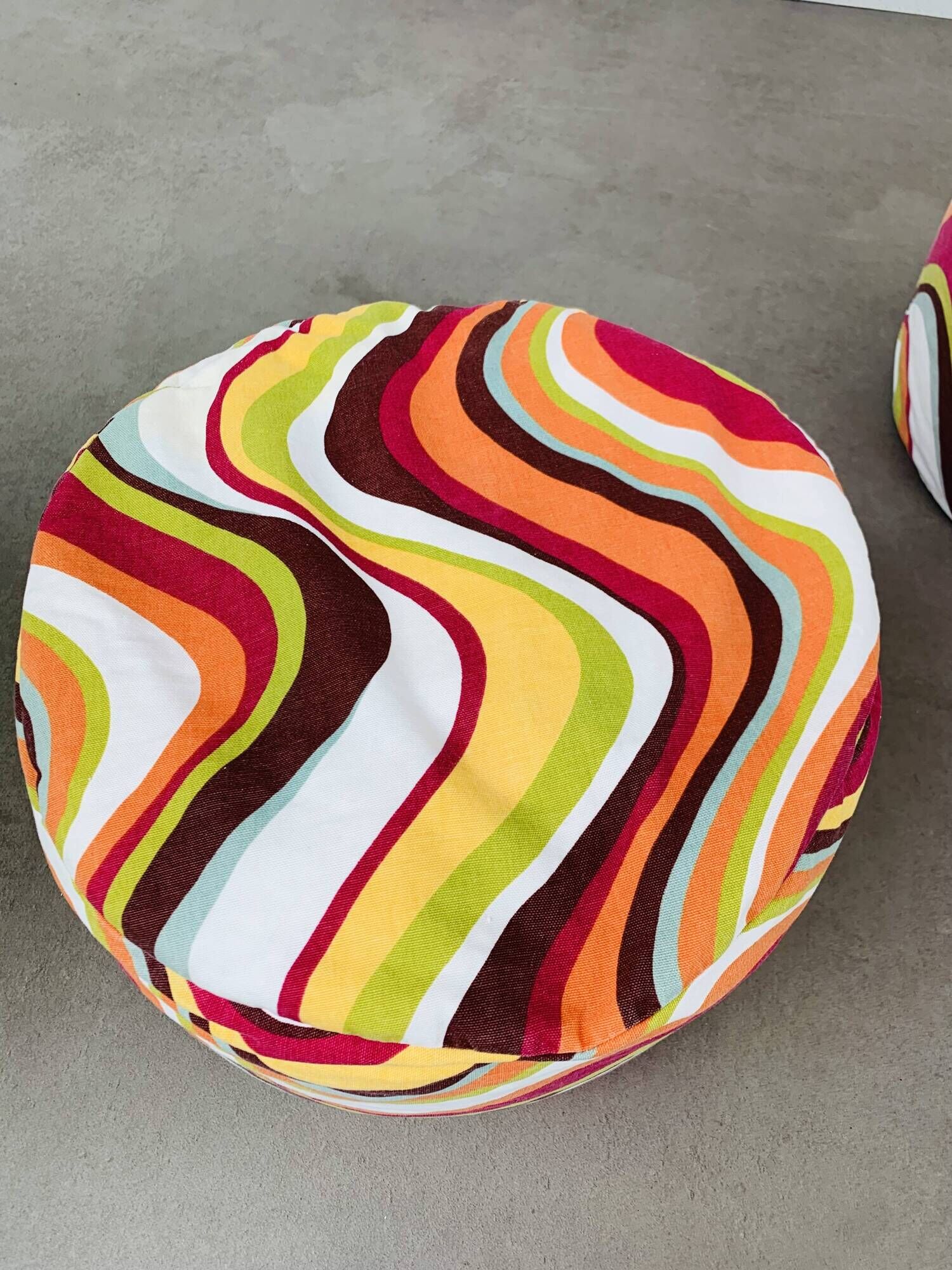 Pair of "psychedelic" fabric poufs from the 70s.