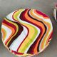 Pair of "psychedelic" fabric poufs from the 70s.