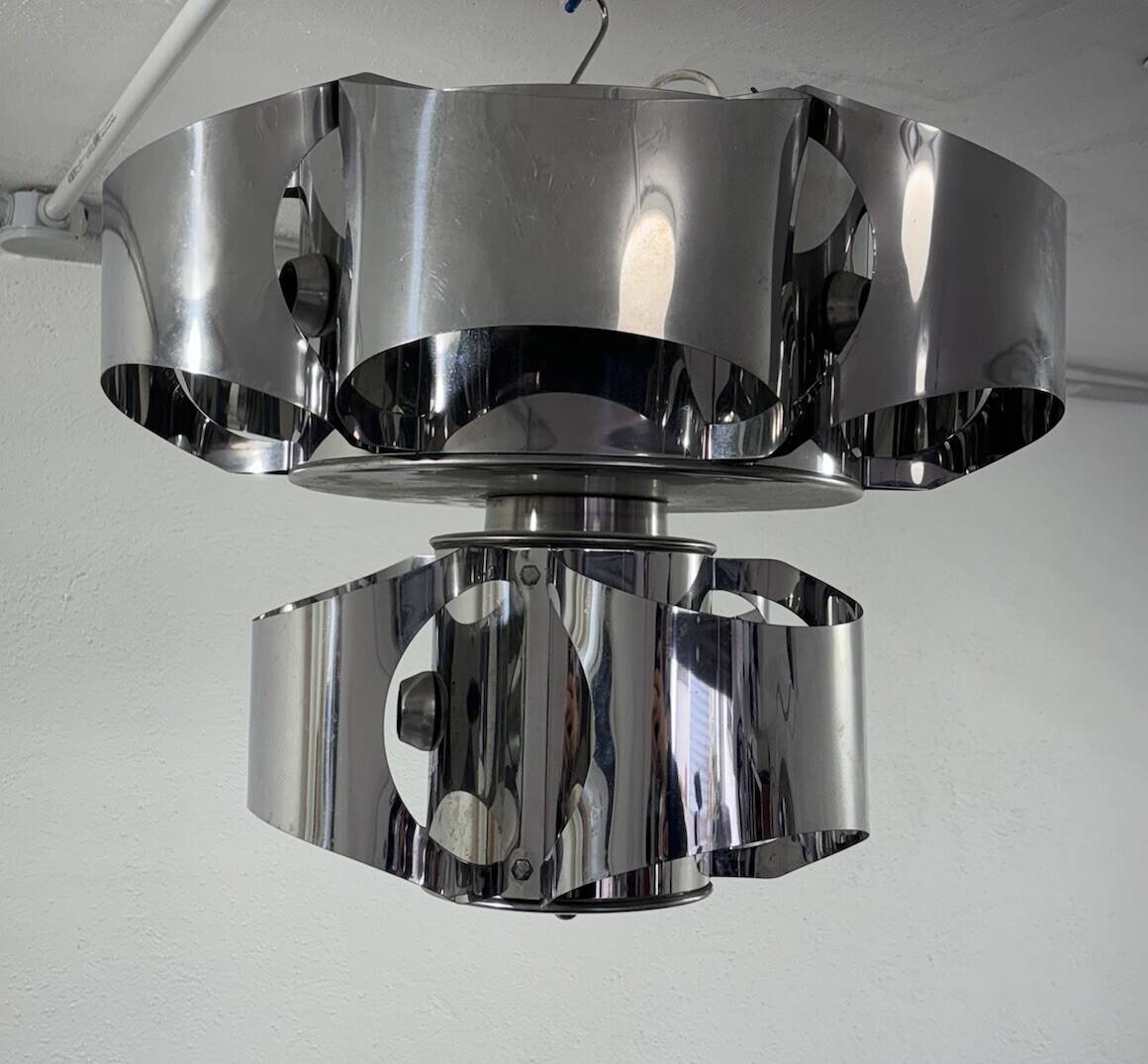 Curved steel chandelier attributed to Max Sauze, 9 lights