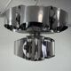 Curved steel chandelier attributed to Max Sauze, 9 lights