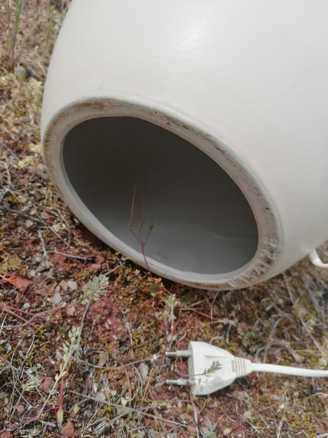 Vintage ceramic table lamp and golden lampshade.