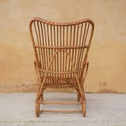 Vintage rattan chair by Louis Sognot