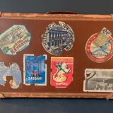 Old travel suitcase and legendary stickers, 1920