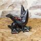 Glazed ceramic ashtray in the shape of a bird.