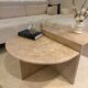 Half-moon travertine coffee table