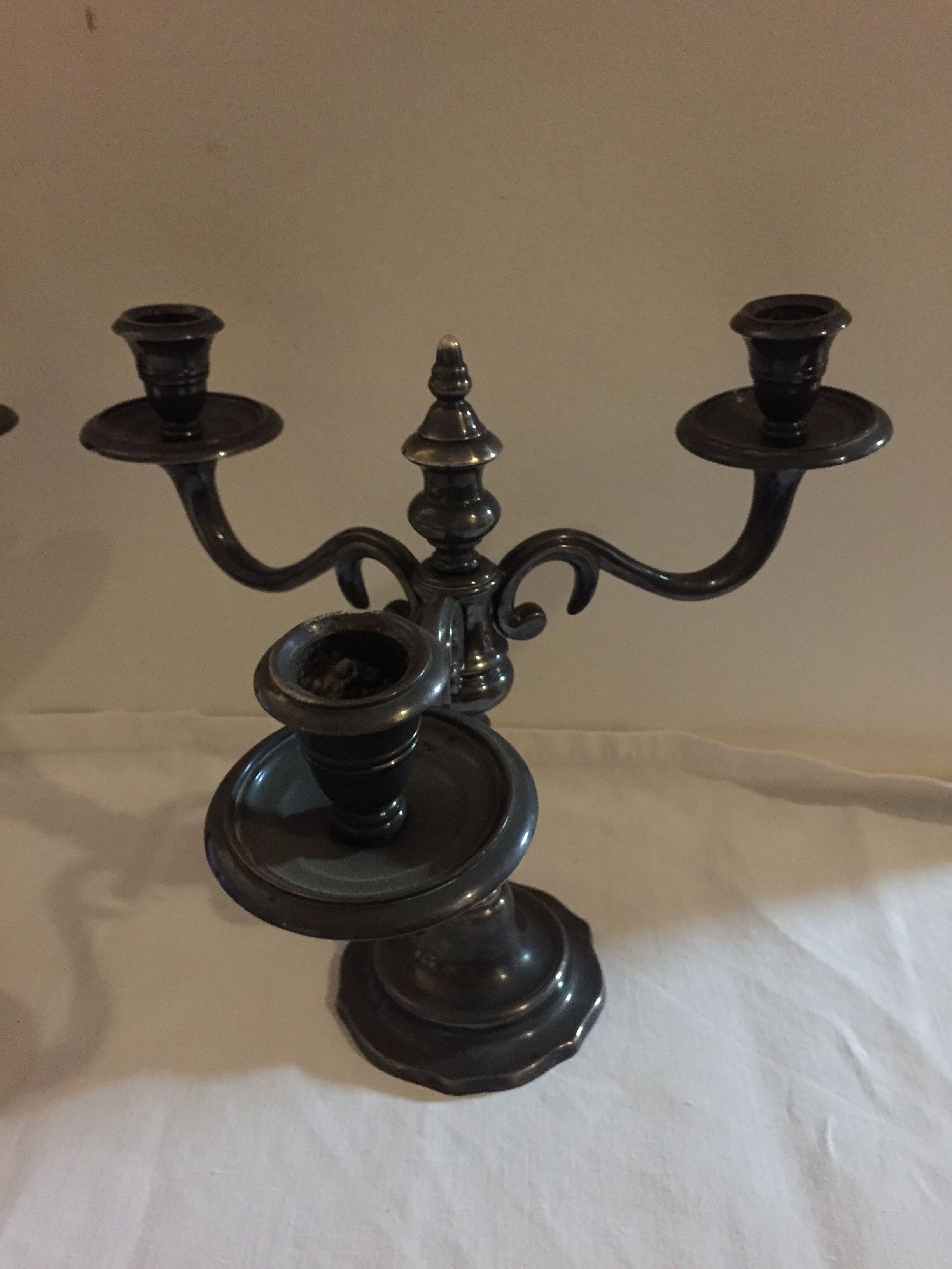 Pair of candlesticks in silver metal