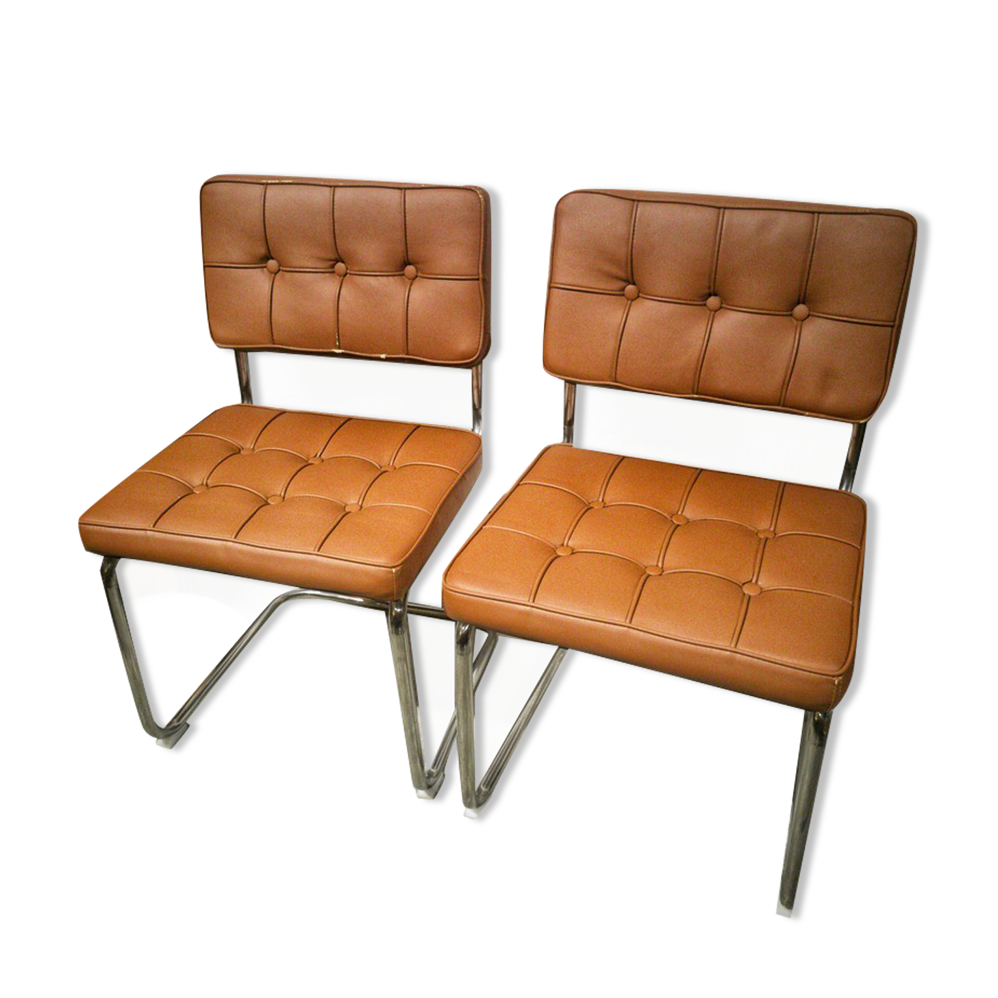 Pair of cantilever chrome and skaï chairs