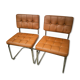 Pair of cantilever chrome and skaï chairs