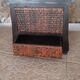 Wooden chest and braided rice straw