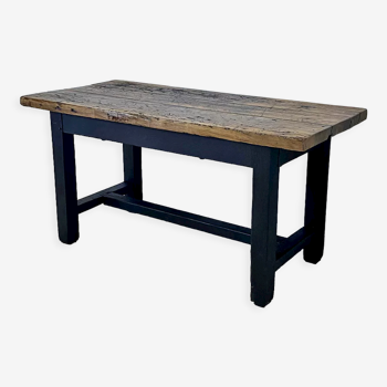 Blackened wood farmhouse table and varnished top