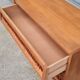 Commode vintage pied compas et rotin