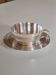 Silver-plated metal cup and saucer