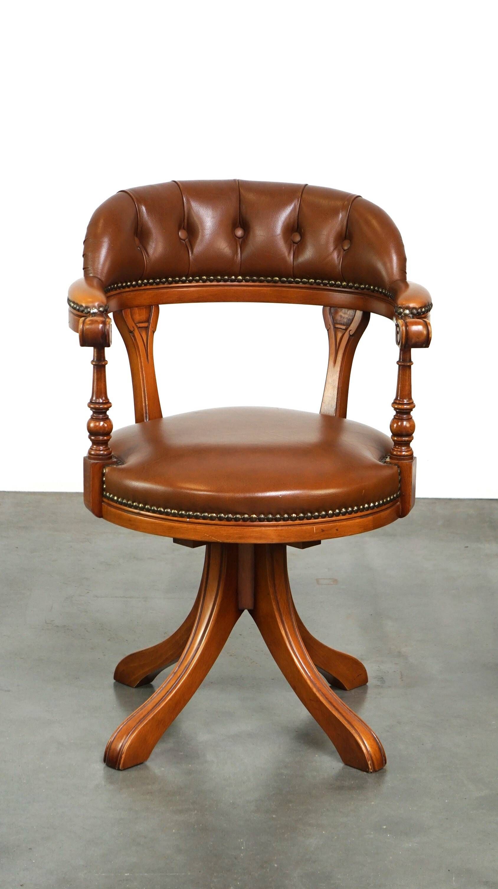 Swivel English style Chesterfield armchair/office chair in brown cowhide