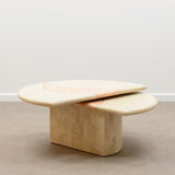Travertine coffee table with swiveling top.