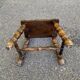 Small vintage low stool made of turned solid wood footrest 1960