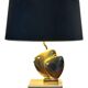 Brass lamp in the shape of a fish by Somchai Hattakitkosol.