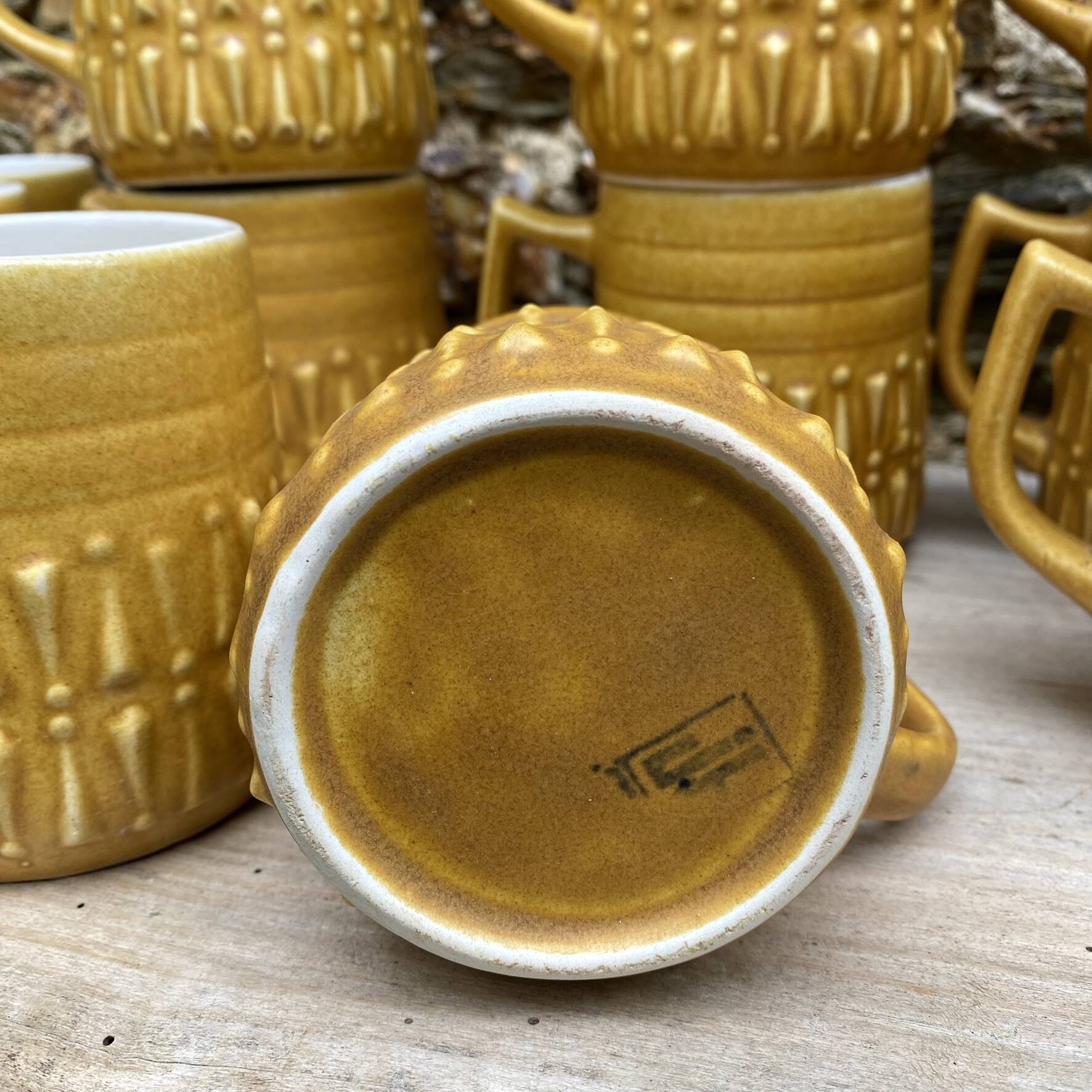 Vintage BP ceramic mugs from the 1970s.