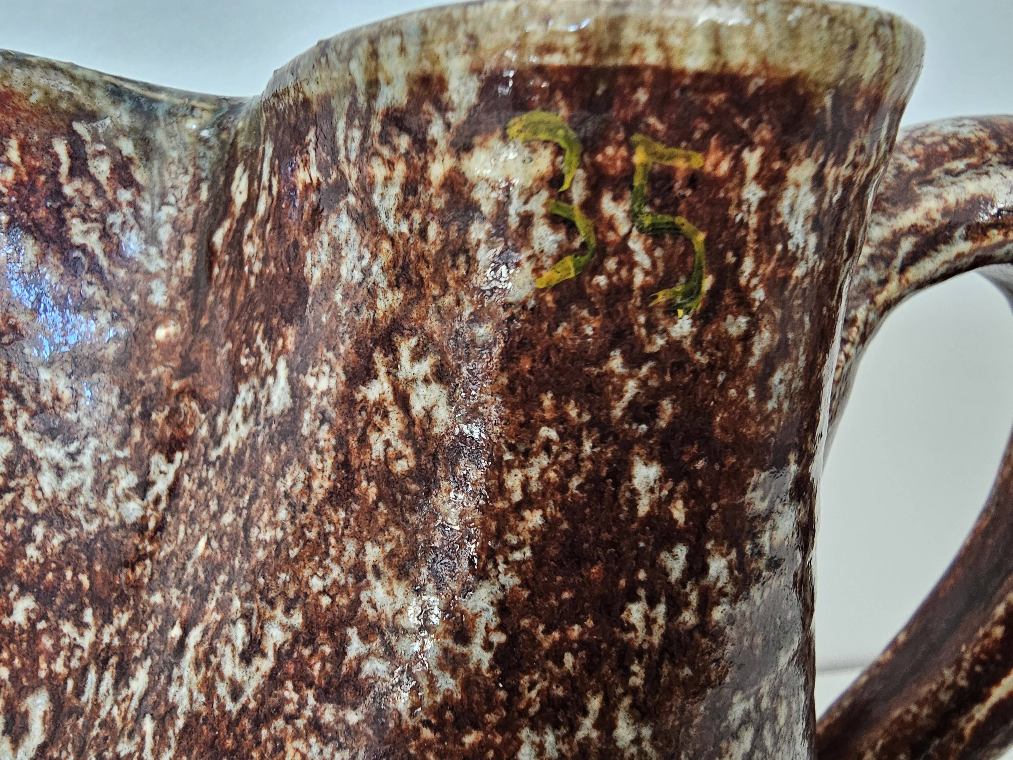 Glazed ceramic pitcher signed pictogram accolay - height 17cm