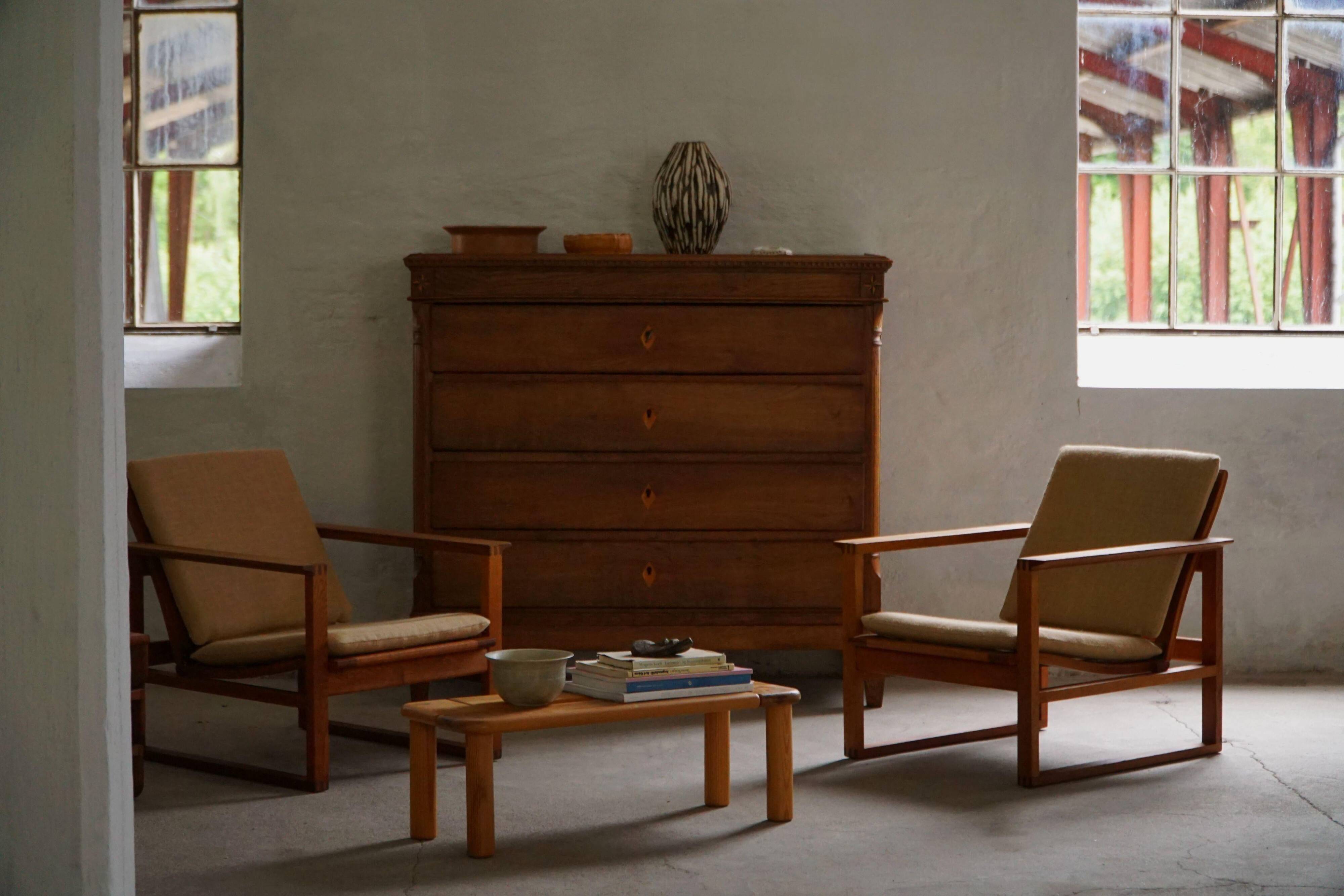 Børge Mogensen, a pair of BM2256 lounge chairs in oak and jute, Denmark, 1960s.