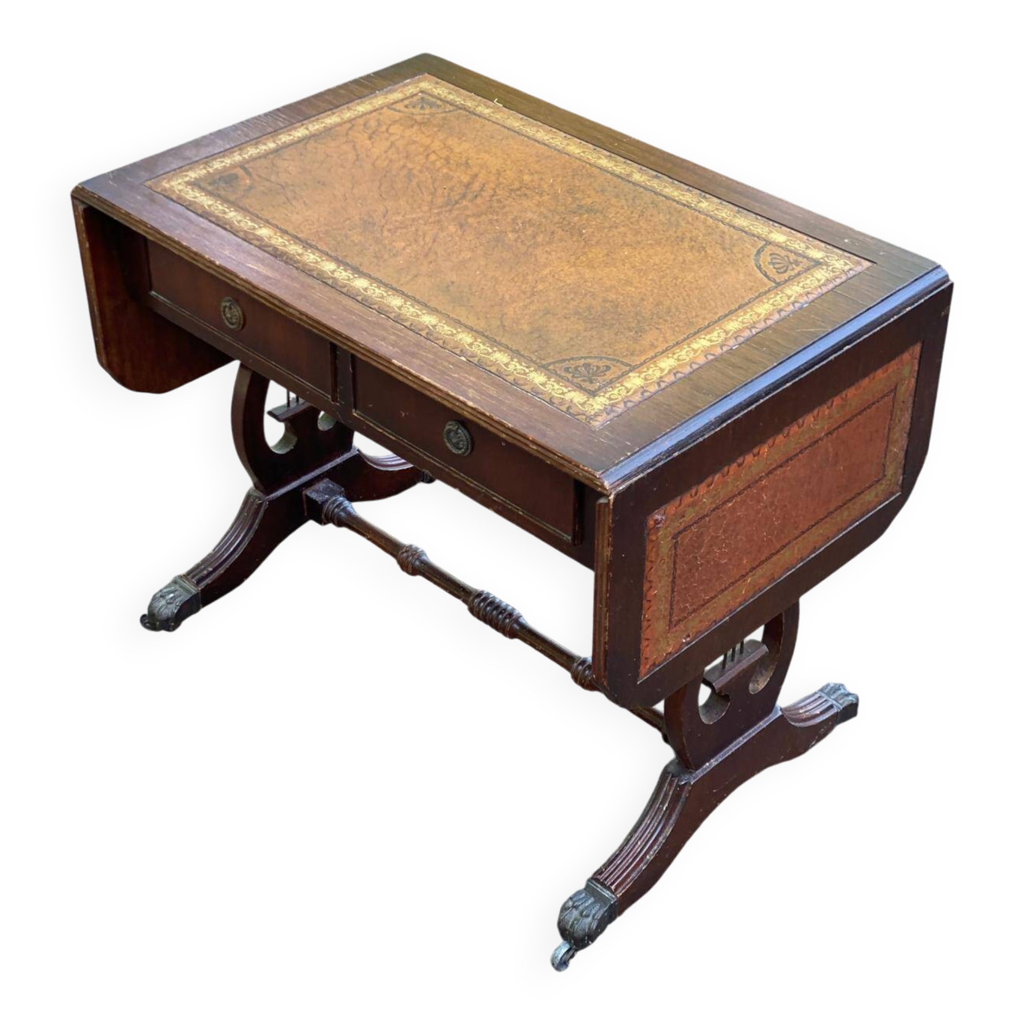 Victorian English extendable coffee table made of solid mahogany and leather.
