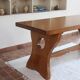 Solid wood dining table, sculpted brutalist base, 1960s.