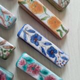 Set of 12 terracotta knife holders