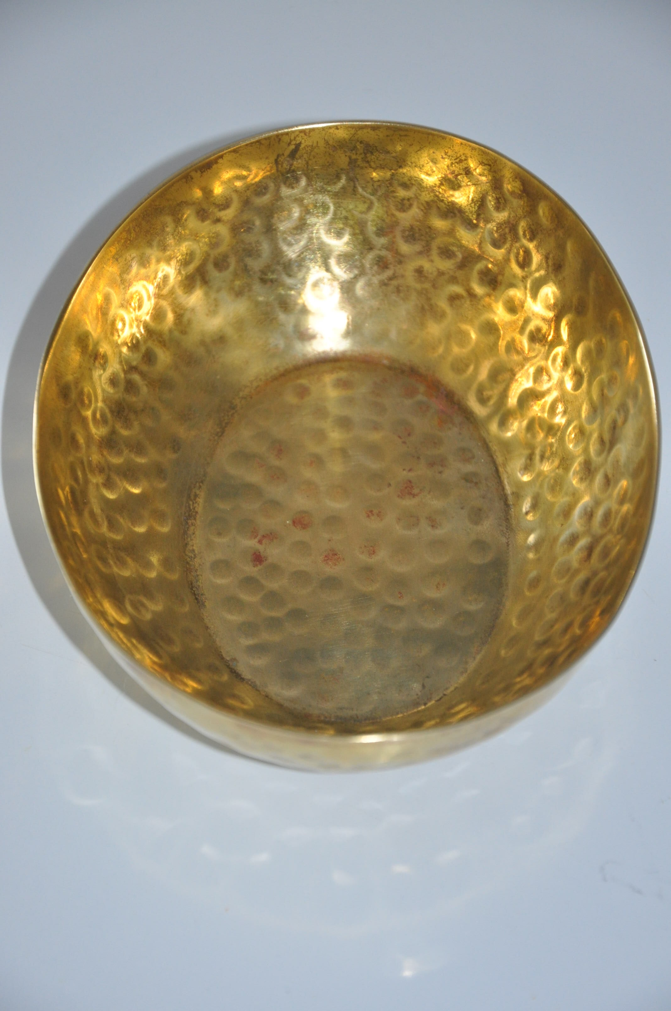 Empty hammered brass pocket