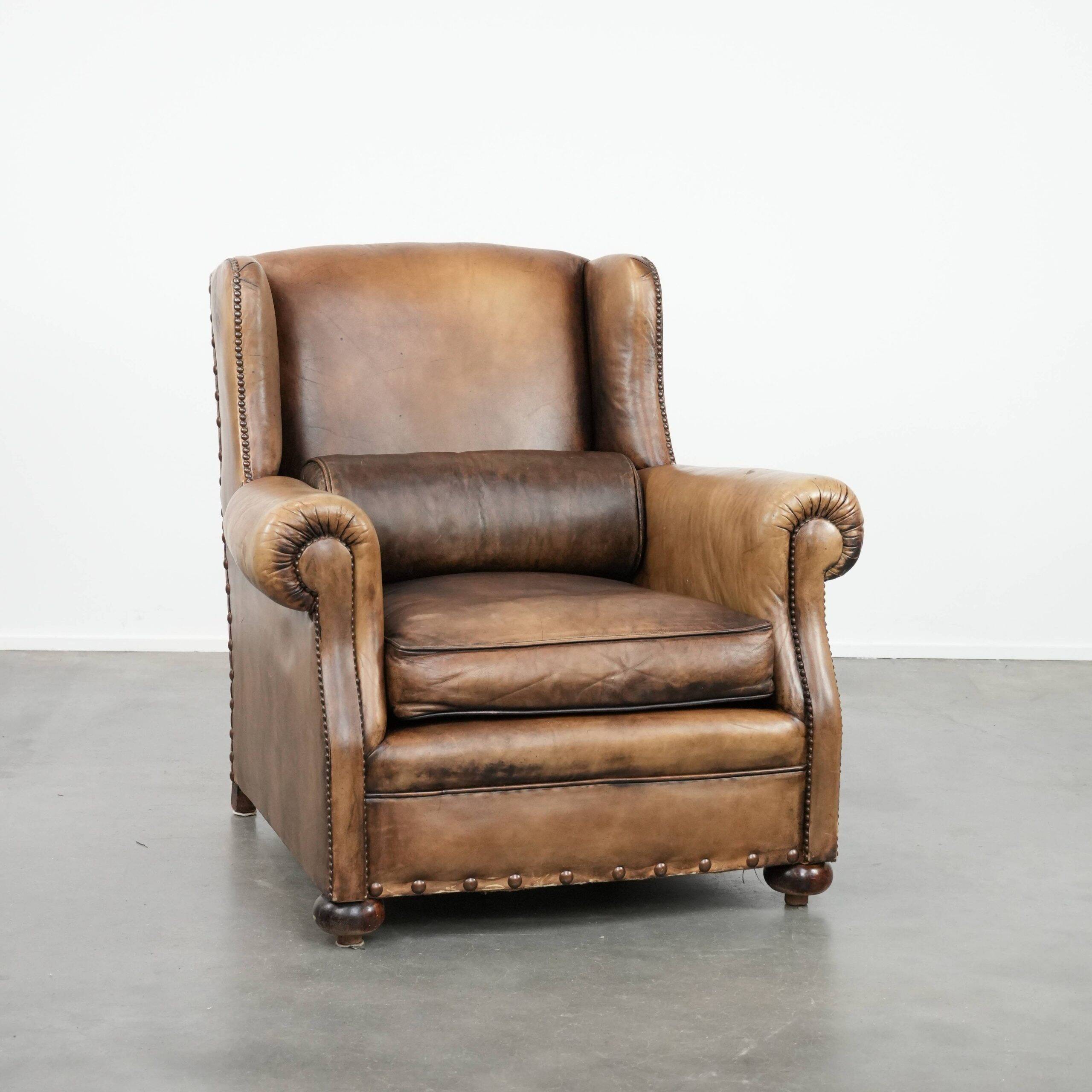 Luxury and large cowhide leather wingback chair in English style