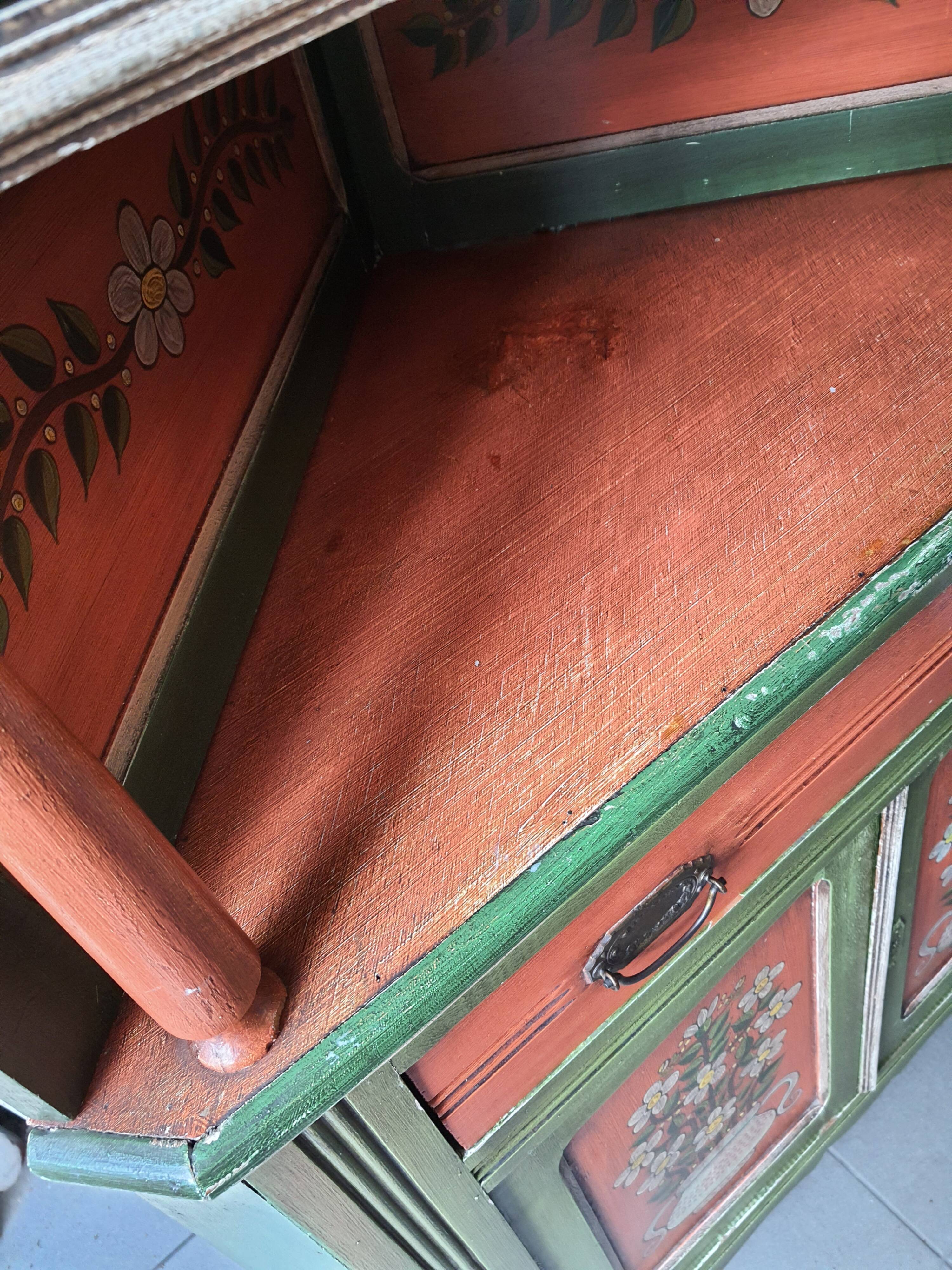 Hand-painted and signed notched cabinet