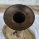 Brass pusher candle holder on oval frame