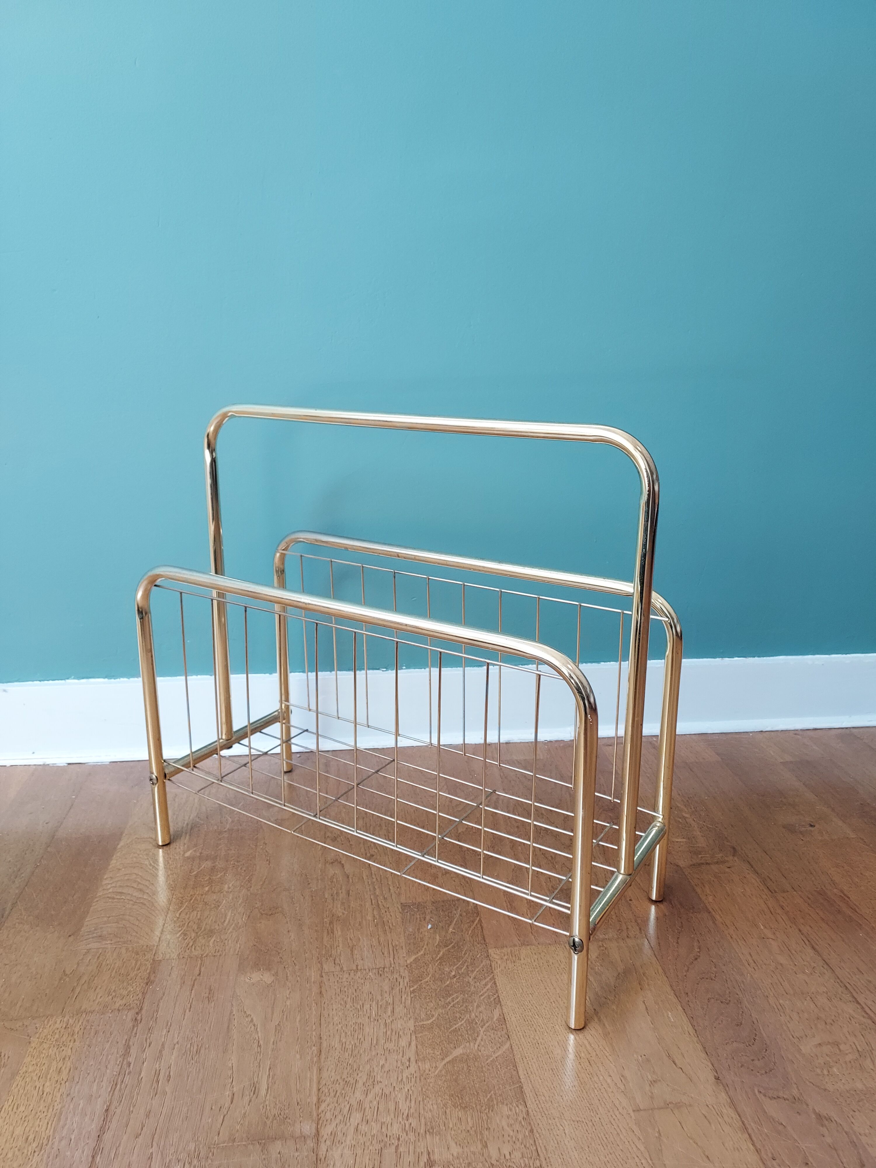 Gilded metal magazine door