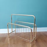 Gilded metal magazine door