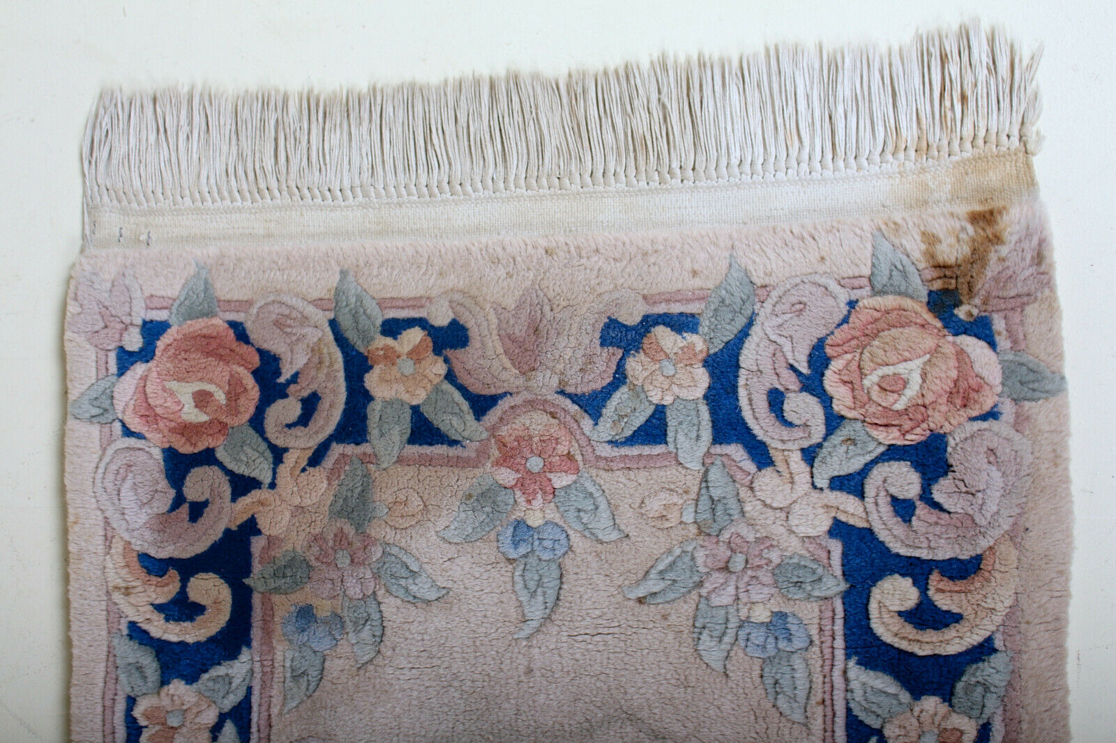 Chinese fringe rug with floral pattern on blue and beige background 63x143cm