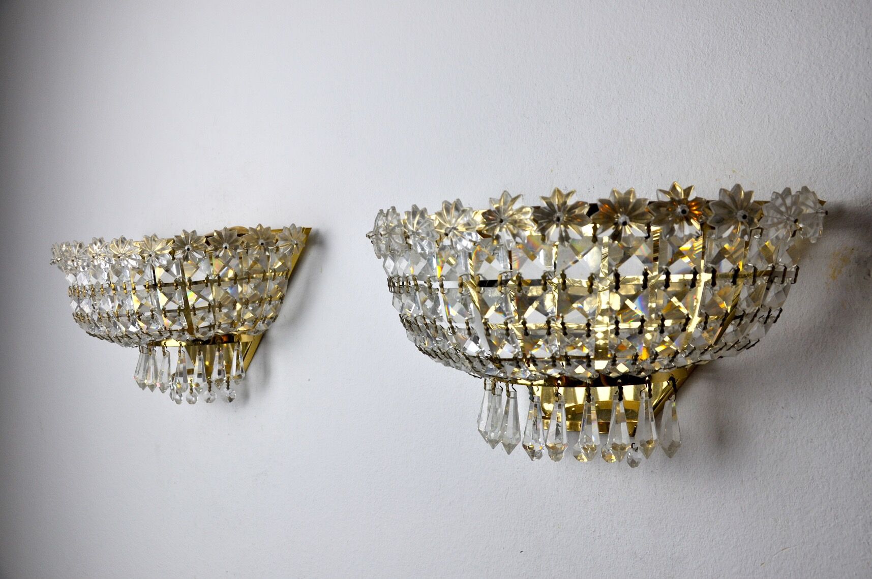 Pair of Regency wall lamps, cut crystals, Italy, 1980