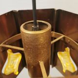 Older hanging lamp, made of metal with yellow prisms.