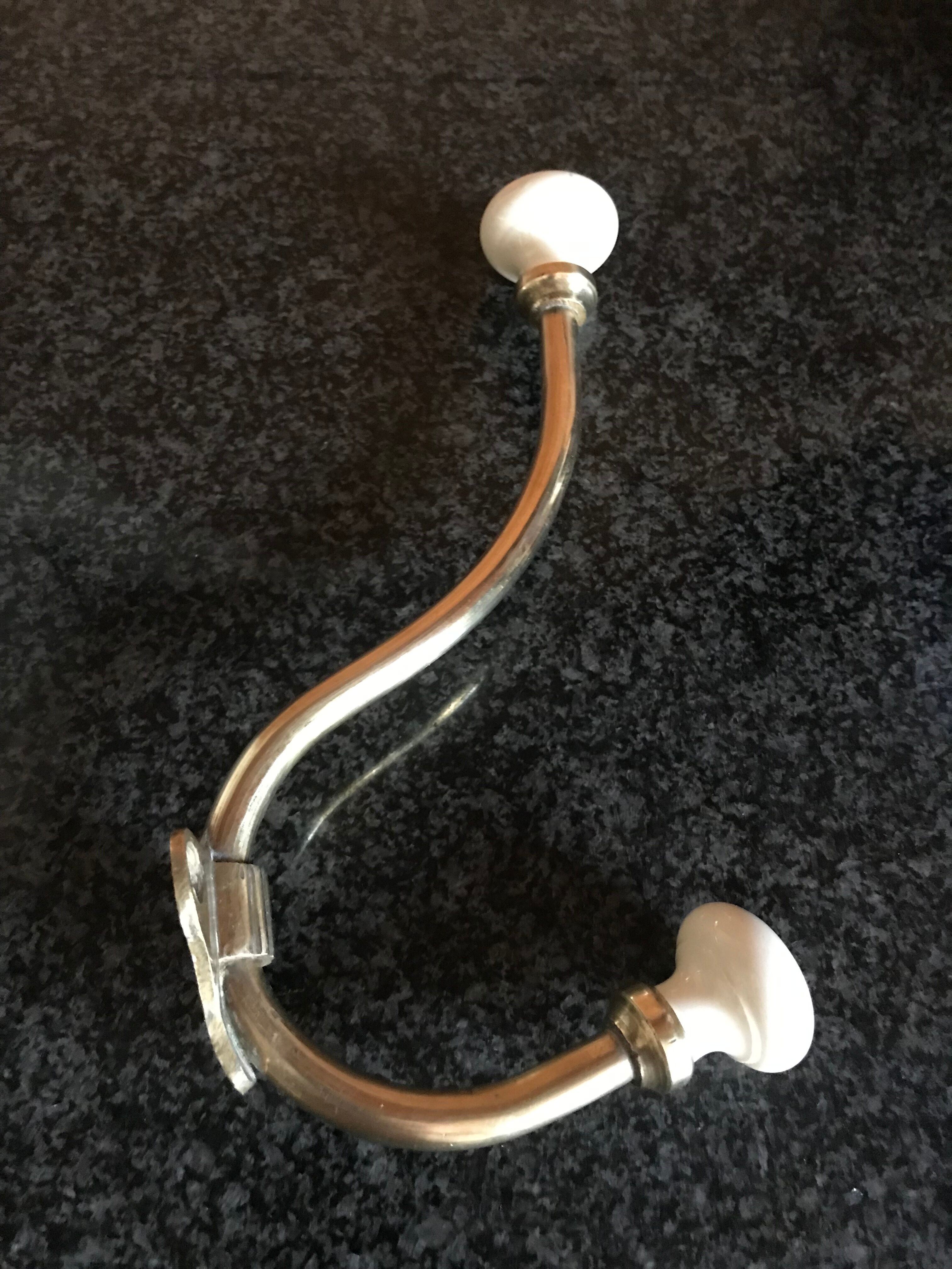 Brass and porcelain hook
