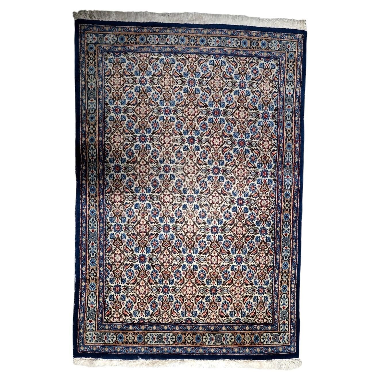 1950s handmade wool floral rug, ivory and blue, 98 × 145 cm
