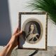 Classic antique man portrait in gilded frame