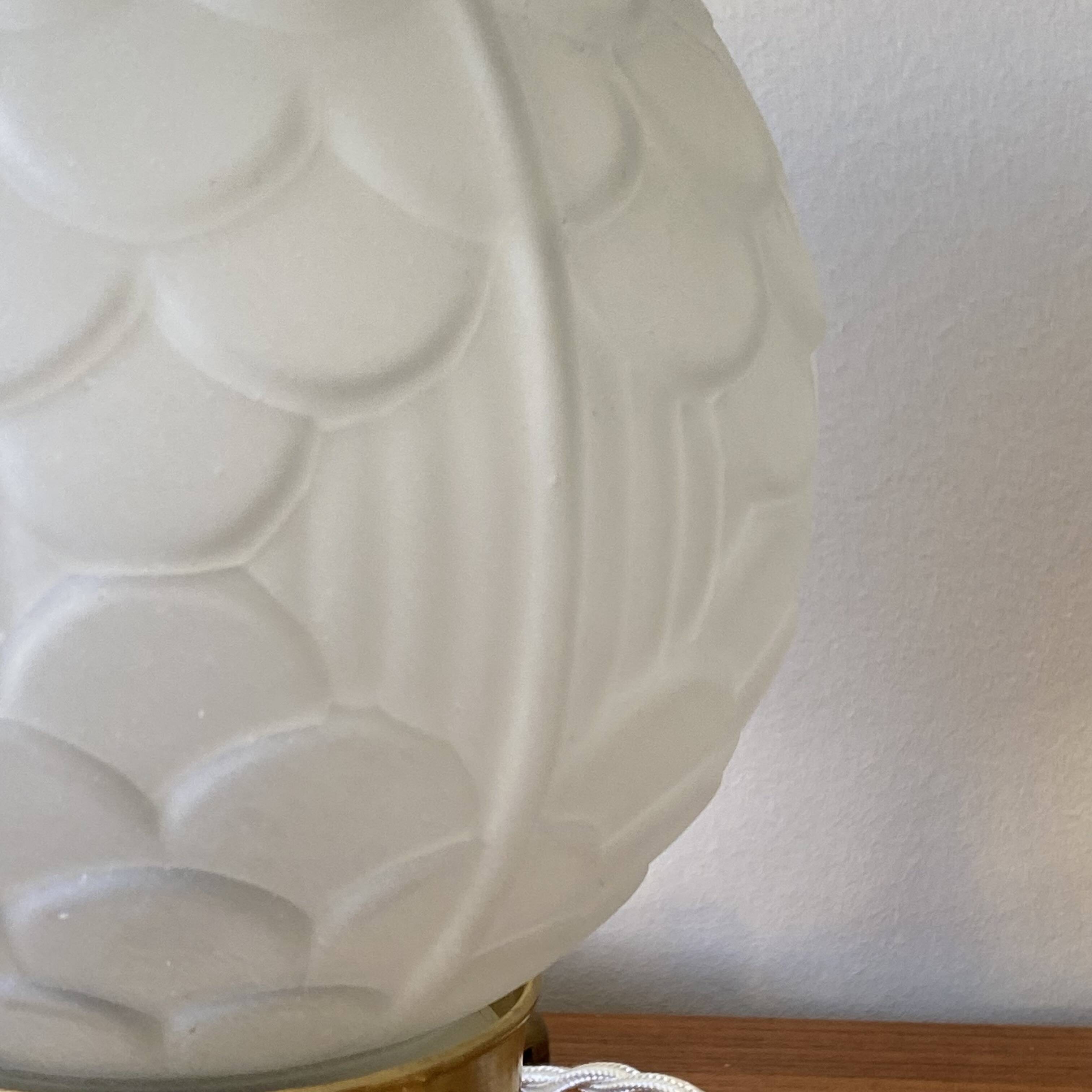 Pair of Art Deco glass globe table lamps with brass base.