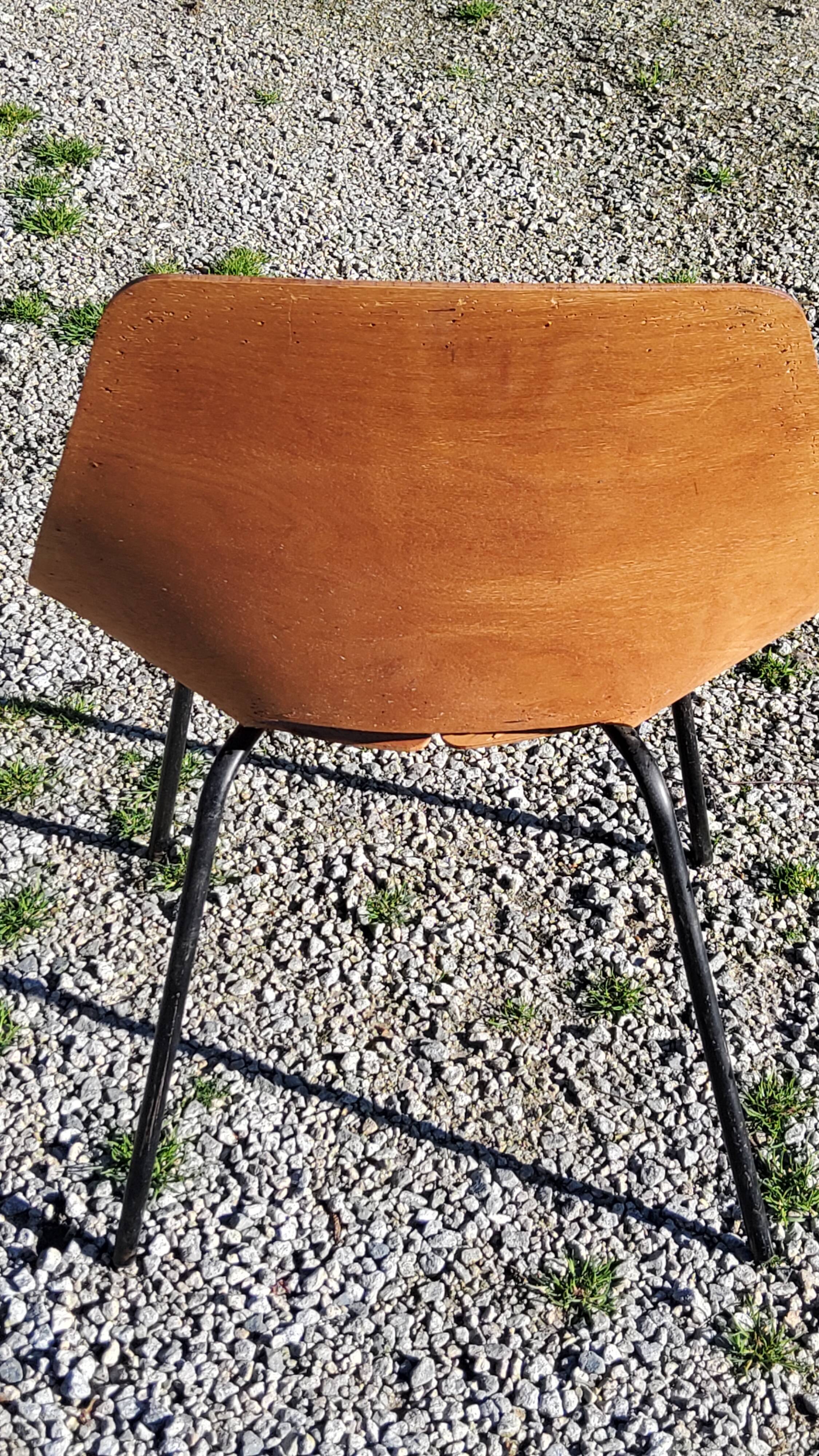 Pair of tonneau chairs by Pierre Guariche plywood base tubes 1954
