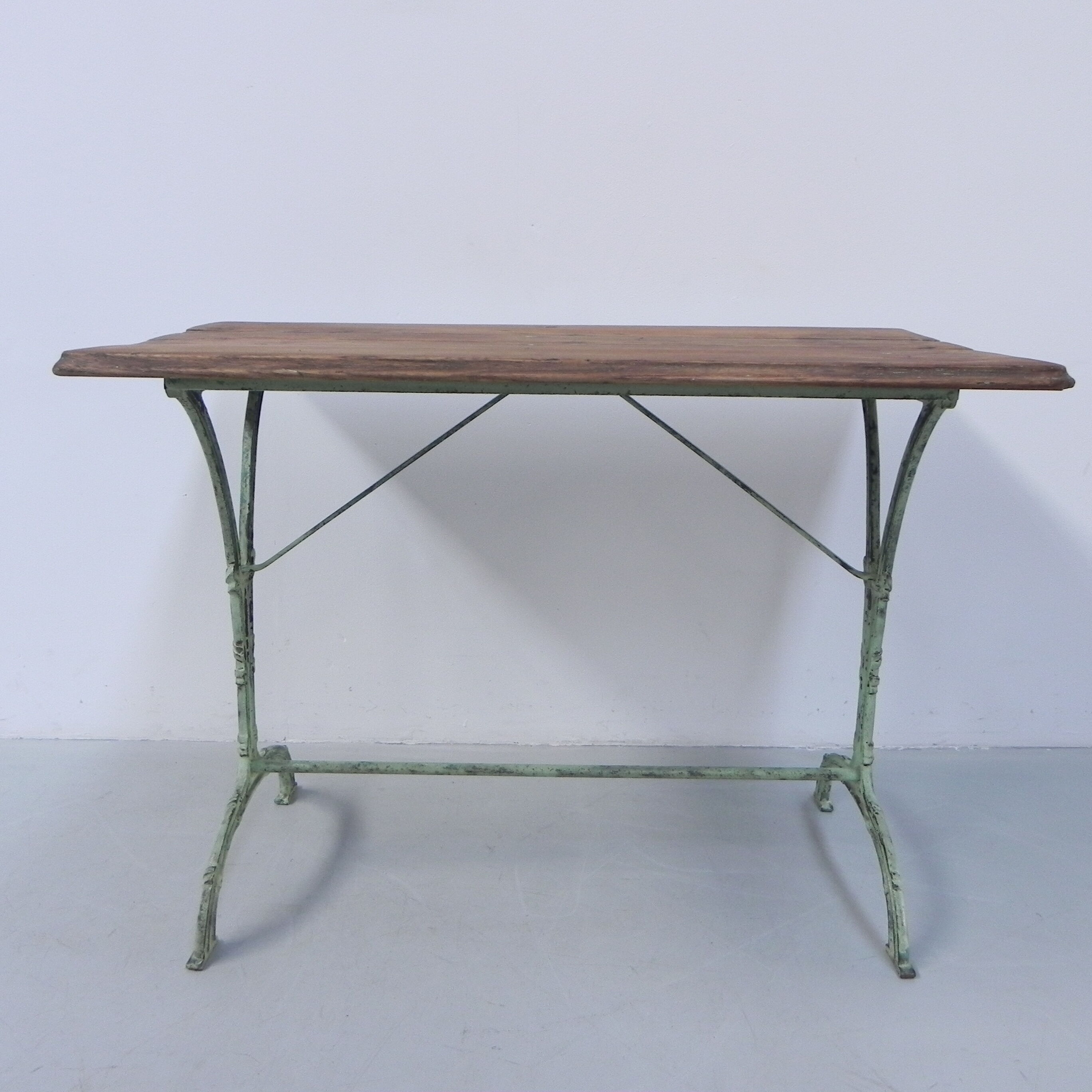 Art nouveau bistro table with cast iron frame