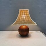 Very rare table lamp in turned teak wood with original braided shade. 1970s