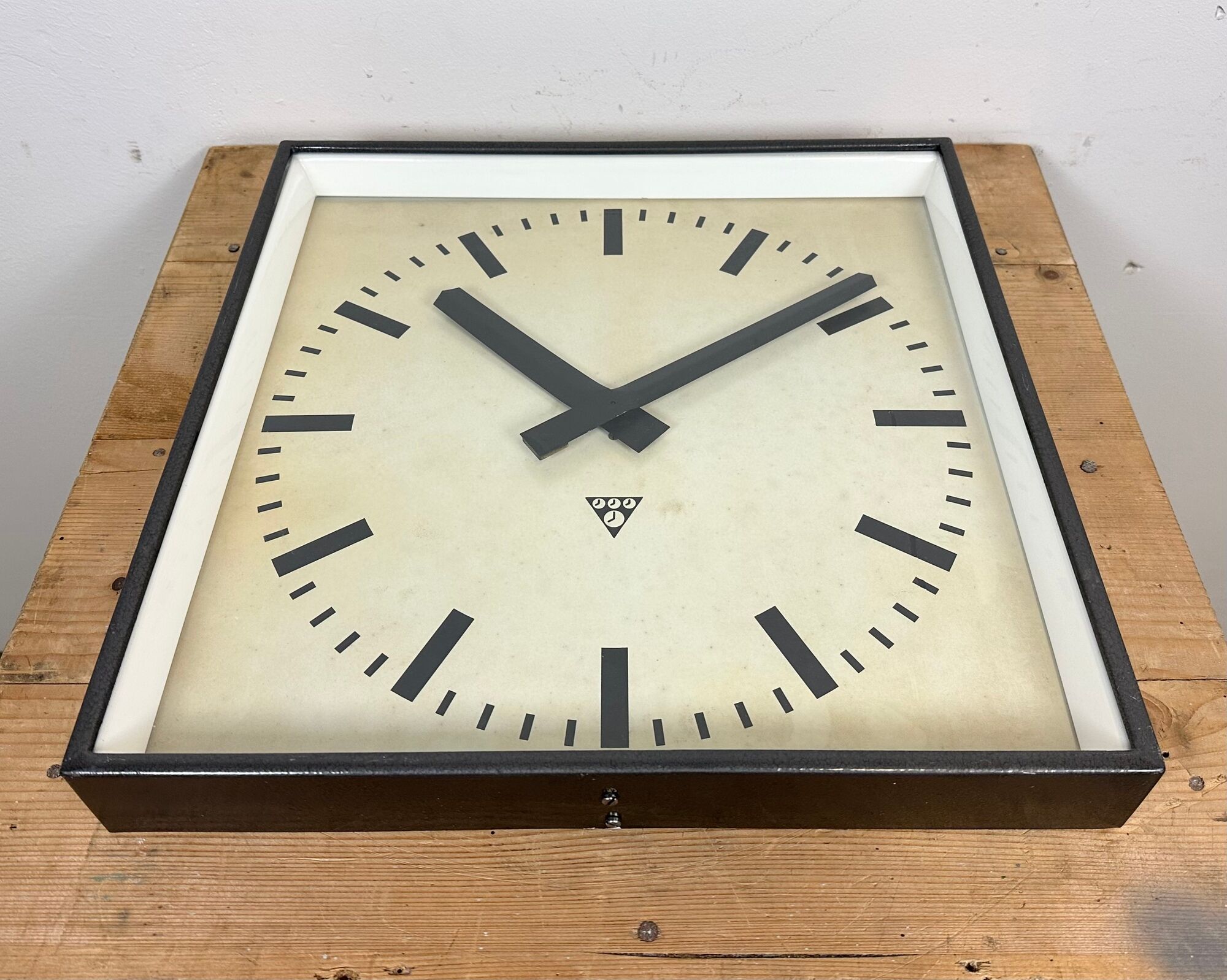 Dark grey square wall clock from pragotron, 1960s