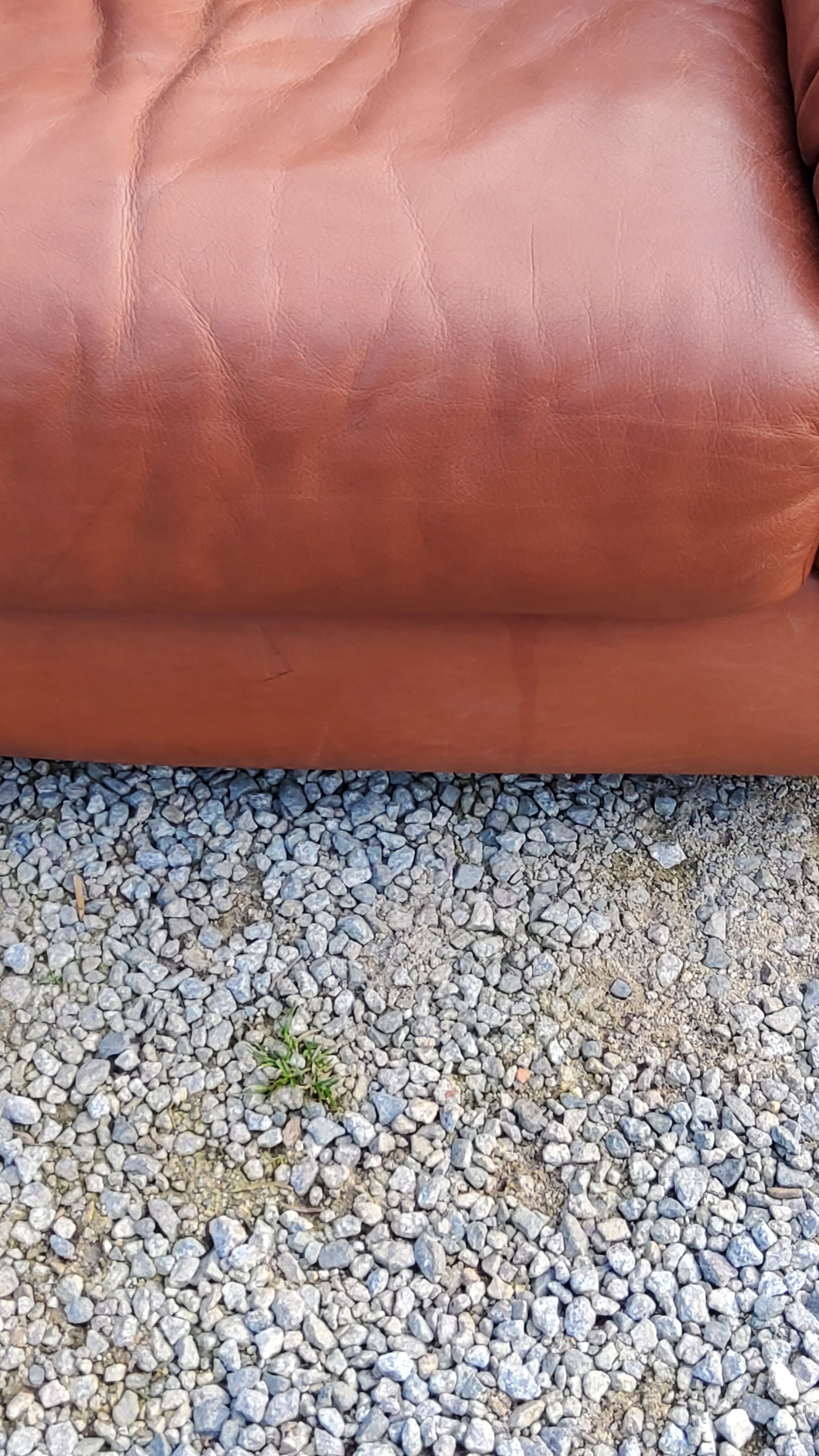 Pair of armchairs and De Sede sofa in cognac leather from the 70s/80s
